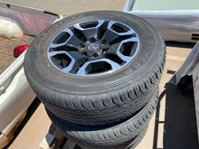 Load image into Gallery viewer, Second Hand Toyota Hilux SR5 Wheel and Tyres Set of 4 - Dunlop Grandtrek PT 265/60R18 Tyres - TL Spares
